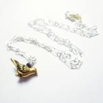 Bird Charm Necklace In Sterling Silver And Brass
